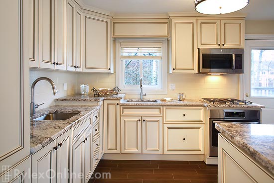 Efficient Kitchen Storage with Corner Cabinets and Multi-level Counter