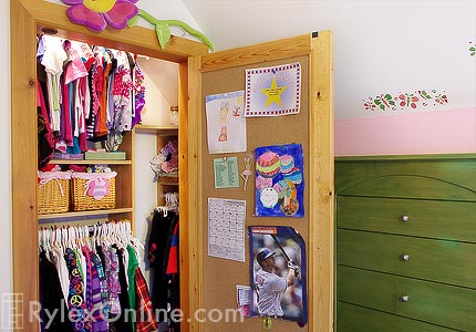 Girl's Reach-In Closet with Adjustable Shelves and Hanging Space