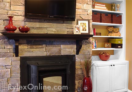 Fireplace Mantel with White Cabinet and Shelves