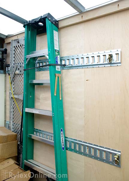 E Track Keeps Cargo Safe on Wall for Transport