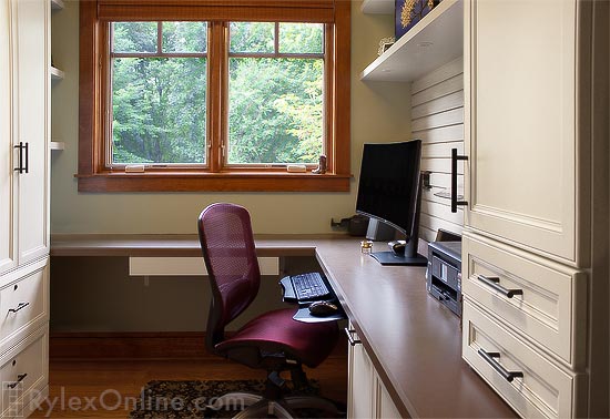 Home Office with L-Shaped Continuous Desktop and Cabinets